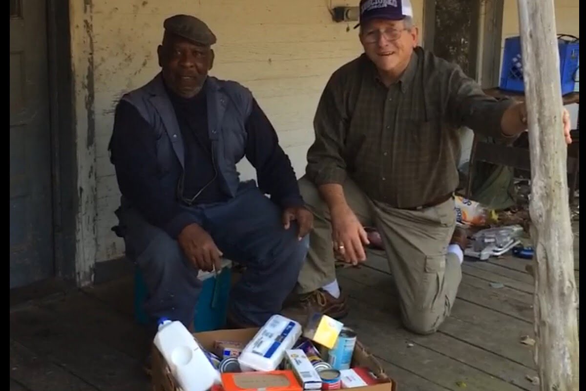 Lions Club members deliver Christmas food baskets (video)