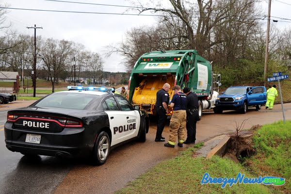 Garbage Truck and Pickup Collide