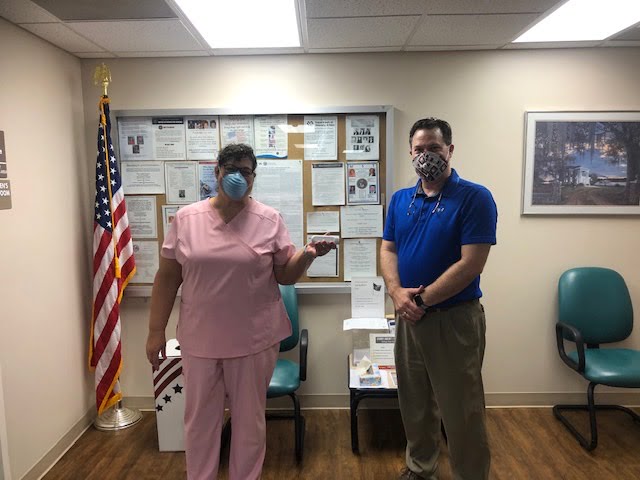 Kosciusko Attala Partnership delivers thermometers to local businesses and schools