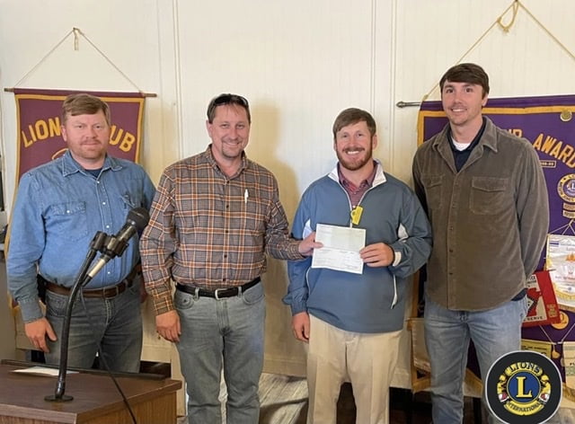 Photo: Local buisness donates to Lions Club food drive