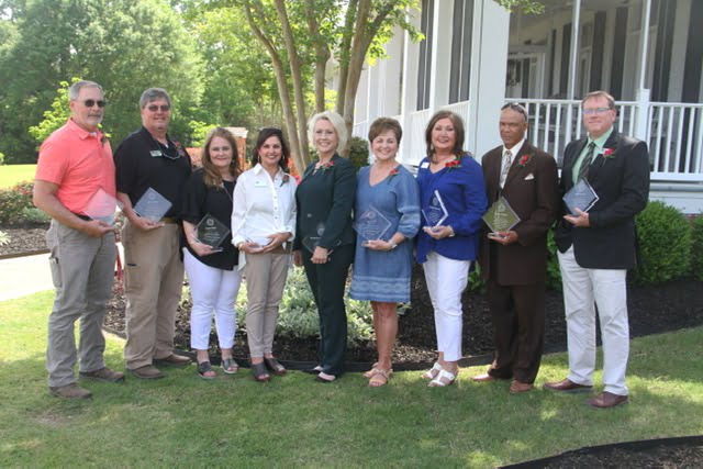 Holmes CC honors 11 retirees