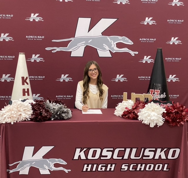 Photo: Whippet cheerleader signs with Holmes