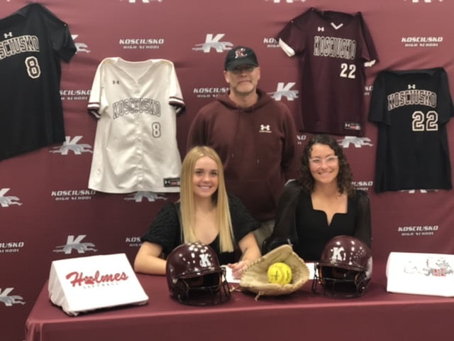 Two Lady Whippets sign with Holmes