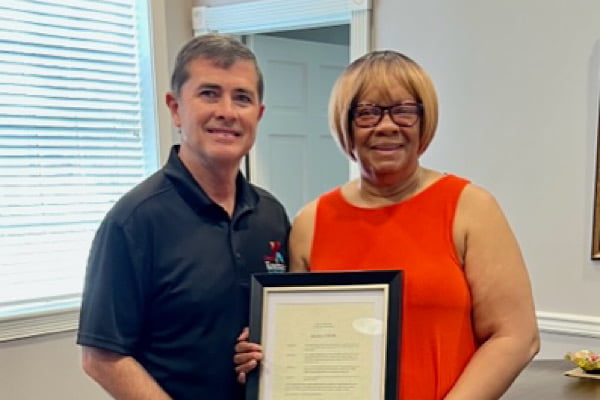 Photo: Longtime E-911 director honored at Kosciusko City Hall