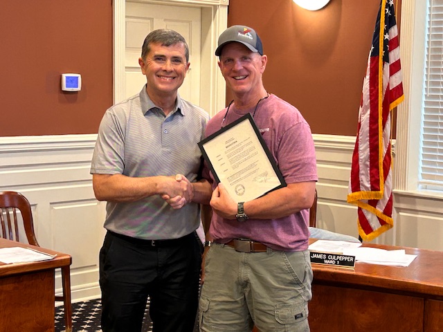 Photo: City passes resolution honoring long time employee