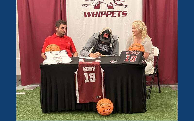 Whippet basketball player signs to play college ball