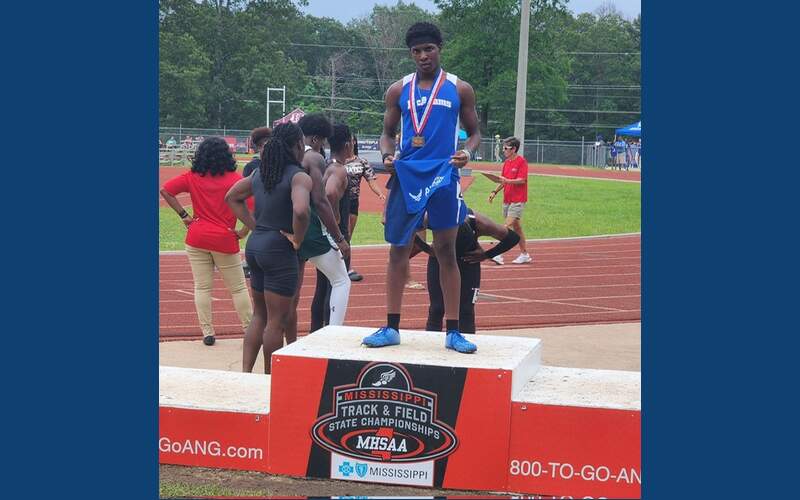 A three-peat and several top three finishes highlight McAdams track & field performance at State Championship