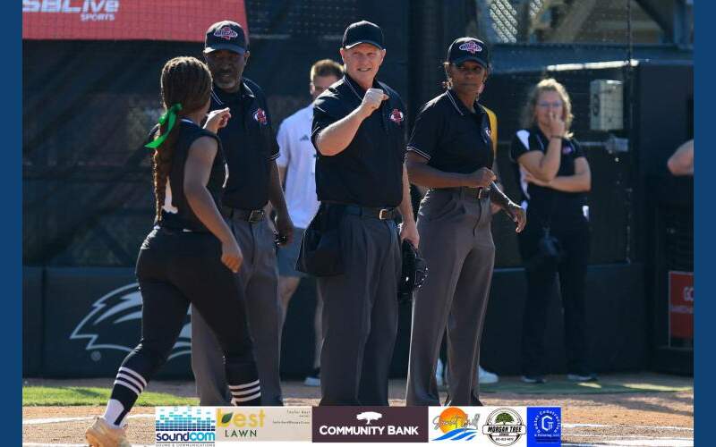 Photo: Kosciusko’s Todd Ables umpires softball state championship