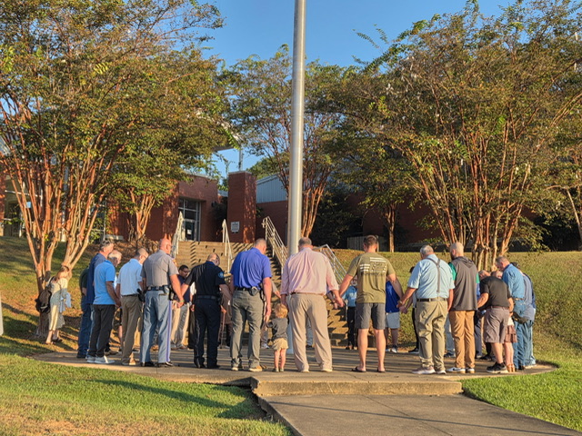 Photo: Morning prayer at Ethel High School: area pastors launch rotating campus prayer group