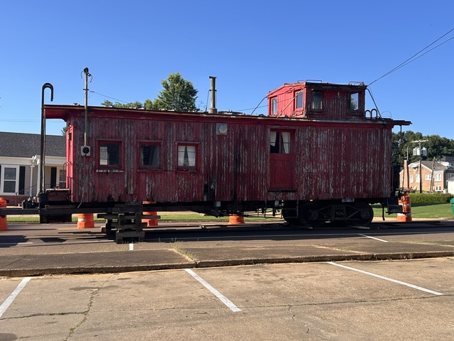Photos: Caboose stops near Attala County Tax Collector office as relocation continues