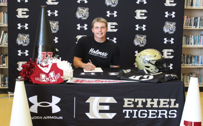 Photo: Fortenberry signs To cheer at Holmes CC